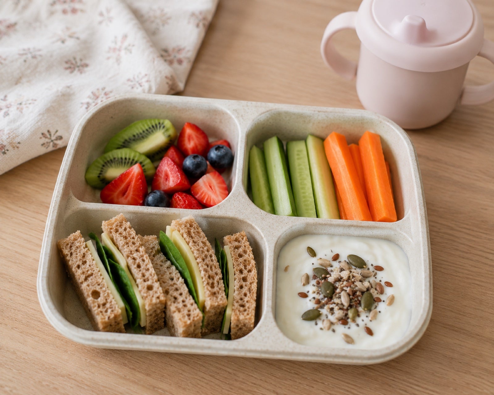 A balanced toddler lunch in a bento tray